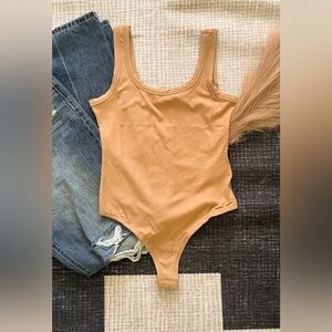 Tan bodysuit